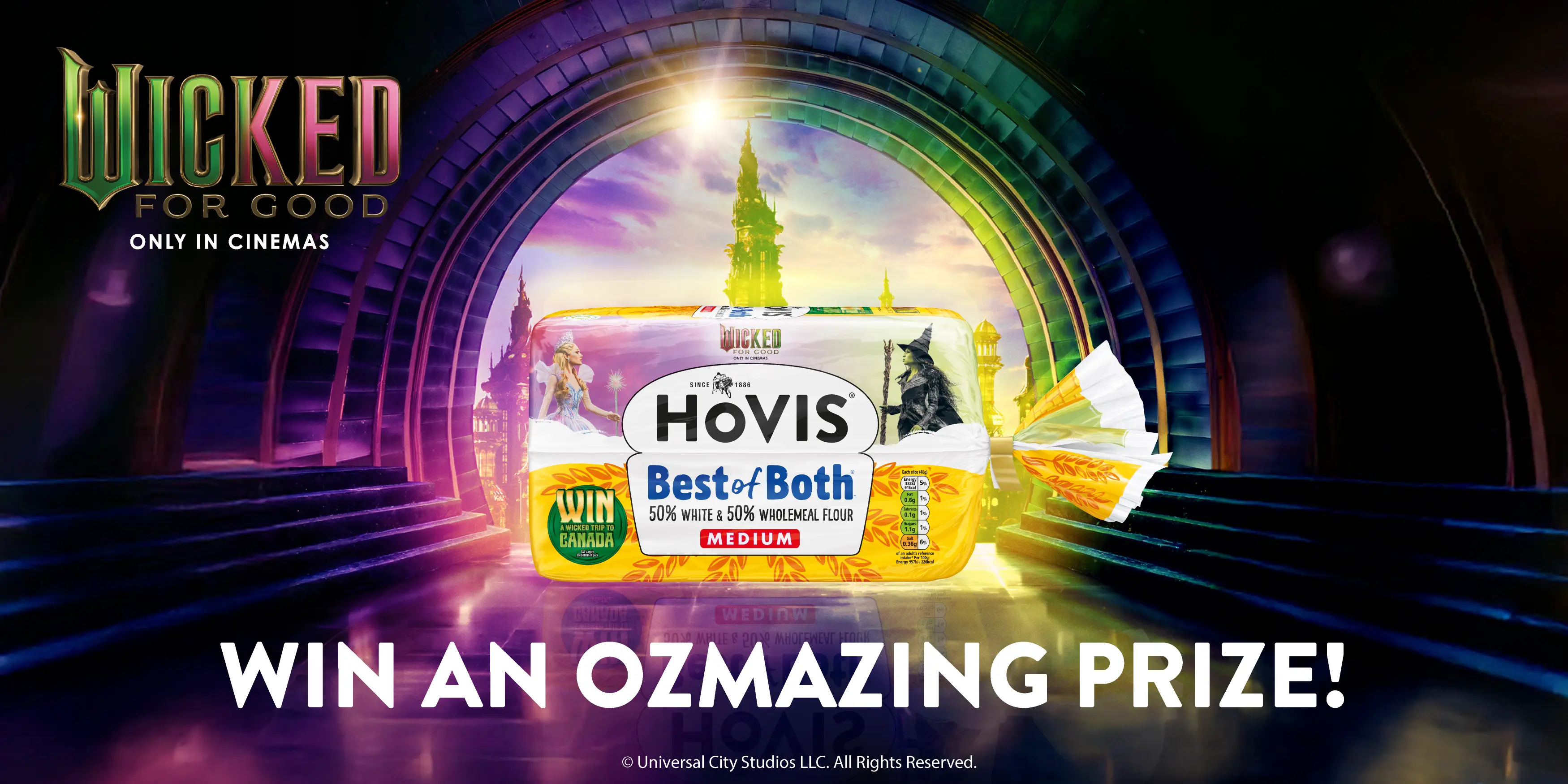 The text reads: Wicked: For Good only in cinemas. Win an ozmazing prize! A Hovis best of both loaf sits in the middle with the emerald city glittering in the background